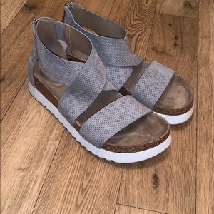 New direction woman’s sandals